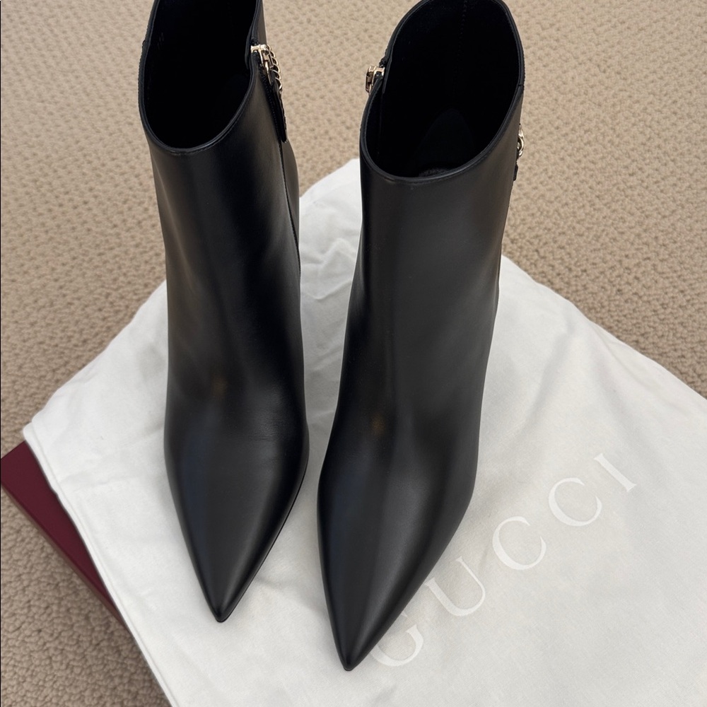 NIB-Gucci Black Heeled Boots with Gold Chain
Size 41 - Picture 8 of 10